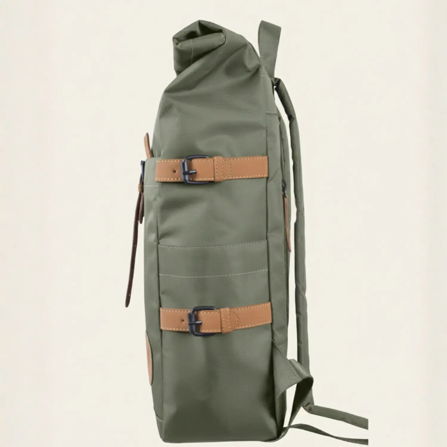 Green backpack with brown straps on a beige background